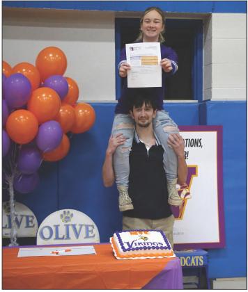 Olive Wildcat’s Jaiden Bridges and Xander Dixon sign letters of intent to be Missouri Valley College Vikings, Friday, March 8. Bridges signed for cheerleading and Dixon signed for powerlifting. Photo by Allie Prater.