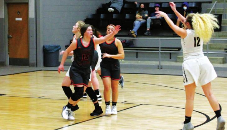 Emyli Creekmore puts up a trey. Creekmore hit two threes Friday on her way to a 13-point game.